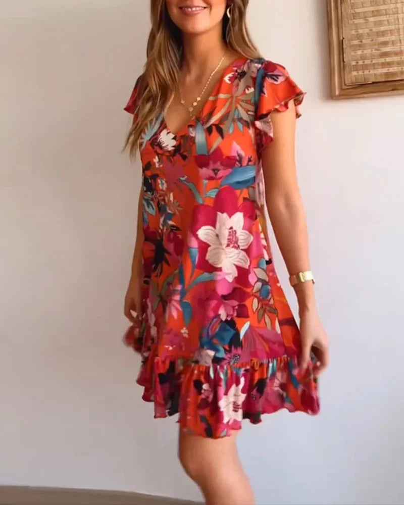 Midikleid mit Blumenmuster – Rüschenärmel & Luftiges Material – Sommerlich & Feminin
