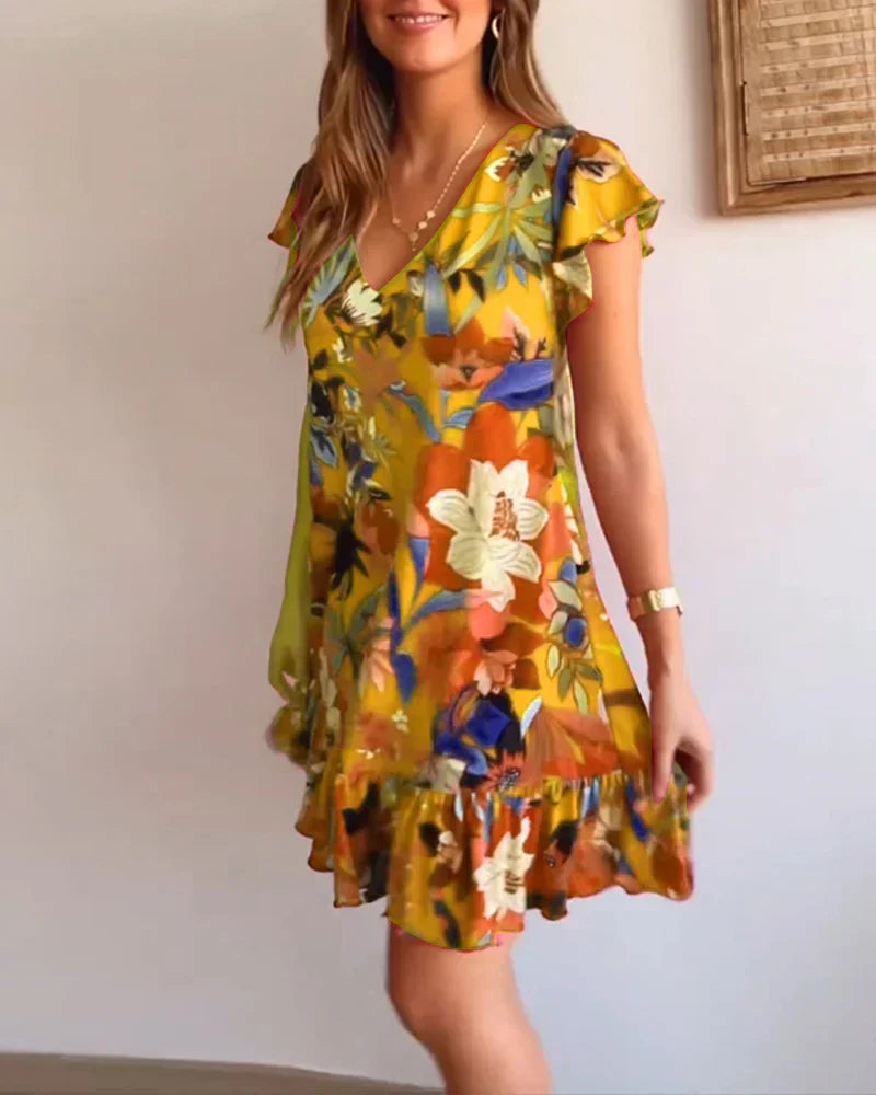 Midikleid mit Blumenmuster – Rüschenärmel & Luftiges Material – Sommerlich & Feminin
